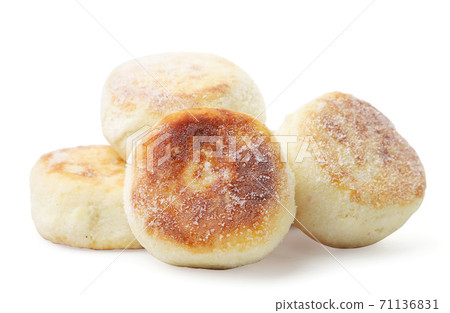 Frozen cheese pancake on a white background, semi-finished product. Isolated 71136831