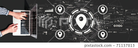Map pin concept with person using a laptop 71137813