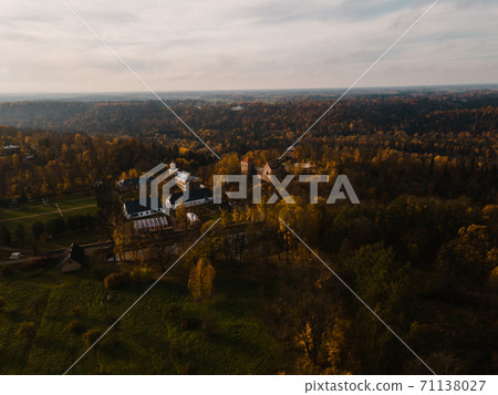 Epic aerial shot: Scenic Sigulda castle in Autumn Epic aerial shot: Scenic Sigulda castle in Autumn 71138027