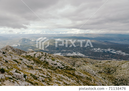 Mountain Biokovo. Mountain landscape with low clouds. Croatia Mountain Biokovo. Mountain landscape with low clouds. Croatia 71138476