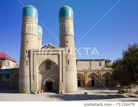 Chor Minor ( Madrasah of Khalif Niyaz-kul), historic gatehouse for a destroyed madrasa in the historic city of Bukhara, Uzbekistan Chor Minor ( Madrasah of Khalif Niyaz-kul), historic gatehouse for a destroyed madrasa in the historic city of Bukhara, Uzbekistan 71138479