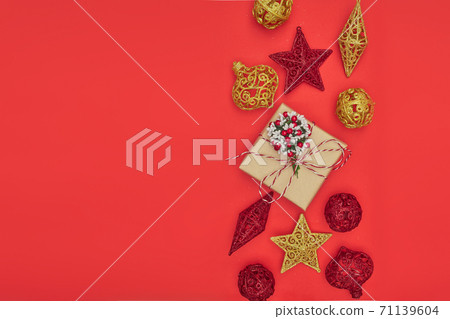 Merry Christmas postcard banner, decorations on red background, copy space 71139604