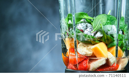 Fresh smoothie blended in blender, back view Fresh smoothie blended in blender, back view 71140511