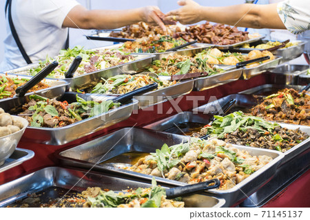 Thai street foods, Thai foods style Rice and Curry at market Bangkok of Thailand. Thai street foods, Thai foods style Rice and Curry at market Bangkok of Thailand. 71145137