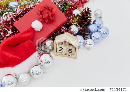 Wooden block calendar and decor on the table. Christmas countdown 71154171