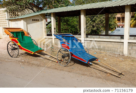 Pulled rickshaw in street of north madagascar. 71156179