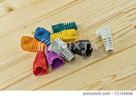 assorted multi-colored cap for wires rj 45 on the engineer desktop 71156698