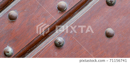 dark brown board with iron bolt shutter security element background 71156741