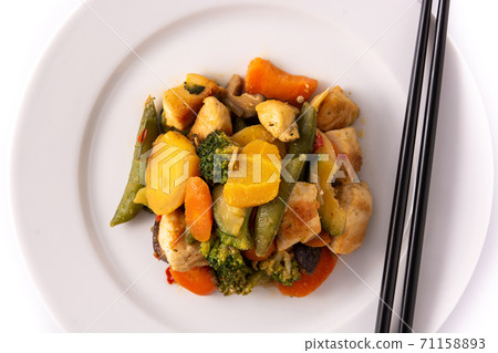 Stir fry chicken with vegetables isolated on white background 71158893
