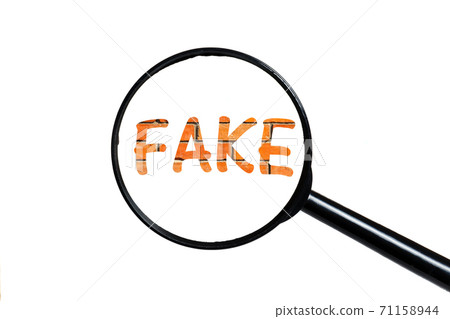 fake and magnifying glass 71158944