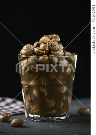 caracolillos en caldo, spanish recipe of snails caracolillos en caldo, spanish recipe of snails 71161591