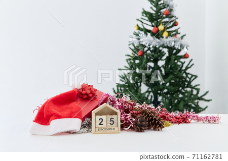 Wooden block calendar and decor on the table. Christmas countdown 71162781