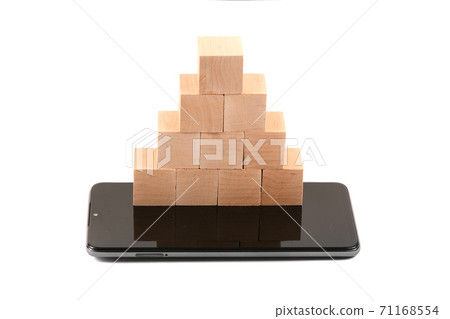 Piramid of cubes on mobile smartphone Piramid of cubes on mobile smartphone 71168554