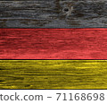 Weathered German flag colored wooden plank background. Texture with copy space. 71168698