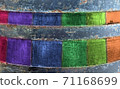 Weathered rainbow colored wooden plank background. Texture with copy space. 71168699