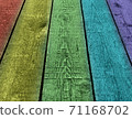 Weathered rainbow colored wooden plank background. Texture with copy space. 71168702