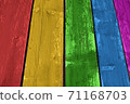 Weathered rainbow colored wooden plank background. Texture with copy space. 71168703