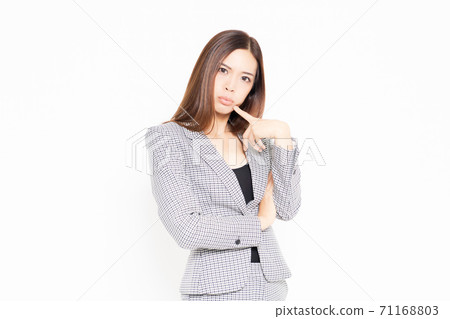 Business woman making a thinking gesture 71168803