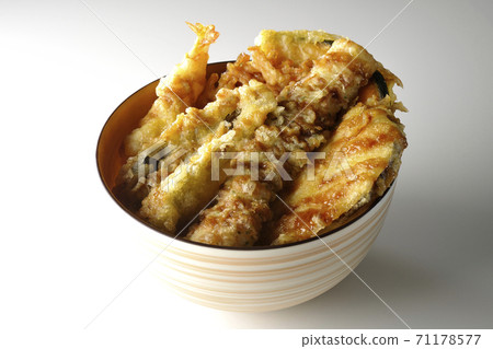 A white background shot of a bowl of tendon with many ingredients such as shrimp, pumpkin, and sweet potatoes A white background shot of a bowl of tendon with many ingredients such as shrimp, pumpkin, and sweet potatoes 71178577