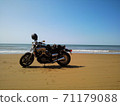 Sandy beach on a motorcycle 71179088