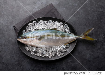 Raw fish on ice. Seafood cooking 71180295