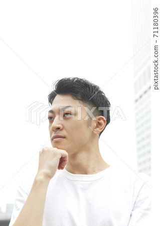Young man lifestyle image with a cheek stick 71180396