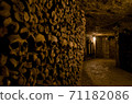 Skeleton wall of catacombs in the catacombs in Paris, France 71182086