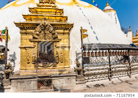 Tower of the Boudhanath Stupa decorated with flags in Kathmandu, Nepal. Tower of the Boudhanath Stupa decorated with flags in Kathmandu, Nepal. 71187954