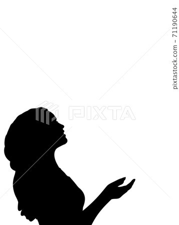 Silhouette of woman waiting for miracle closeup Silhouette of woman waiting for miracle closeup 71190644