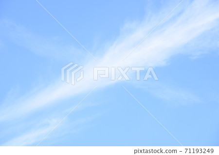 Crossed clouds X-shaped clouds Blue sky 71193249