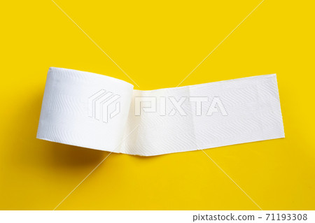 Toilet paper on yellow background. Copy space Toilet paper on yellow background. Copy space 71193308