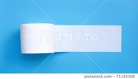 Toilet paper on blue background. Copy space Toilet paper on blue background. Copy space 71193309