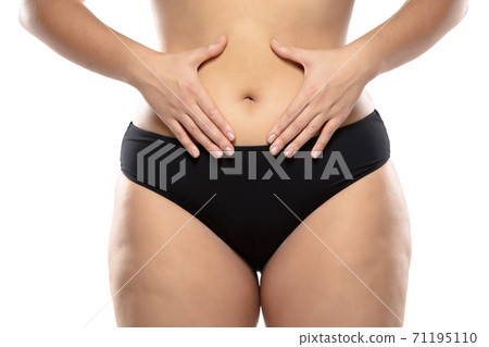 Overweight woman with fat cellulite legs and buttocks, obesity female body in black underwear isolated on white background Overweight woman with fat cellulite legs and buttocks, obesity female body in black underwear isolated on white background 71195110
