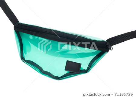 Lacquered transparent green belt bag isolated on white background. Close-up. Lacquered transparent green belt bag isolated on white background. Close-up. 71195729