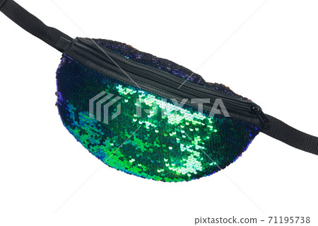 Green shiny belt bag on a white background. Close-up. 71195738