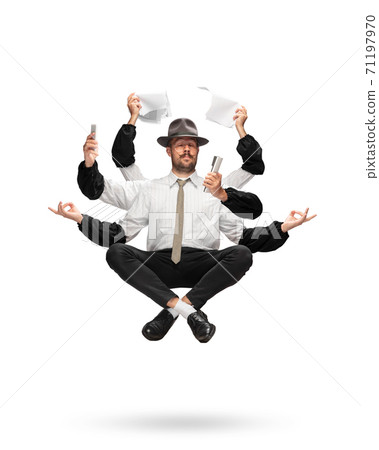 Handsome multi-armed journalist levitating isolated on yellow studio background with equipment 71197970