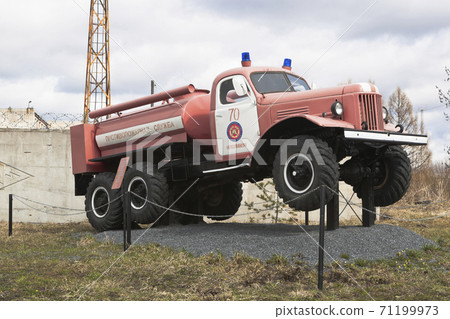 Fire Truck AC-40 on chassis ZIL 157A near the firehouse in the city Kadnikov, Vologda region, Russia 71199973