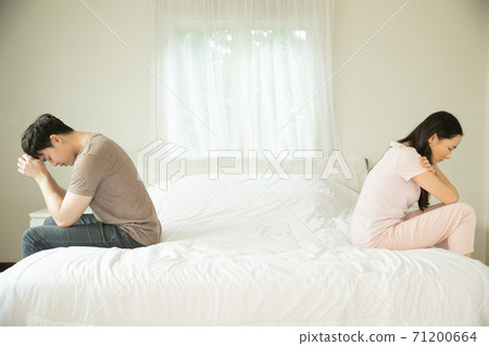 Young couple quarreling in the bedroom 71200664