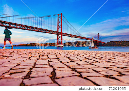 Places of interest in Lisbon, Portugal. Bridge of April 25 and sunset Places of interest in Lisbon, Portugal. Bridge of April 25 and sunset 71201065