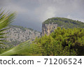 Mountain landscape. The top of the cliff against the background of thunderclouds in the Turkey city of Beldebi. 71206524