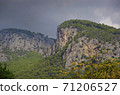 Mountain landscape. The top of the cliff against the background of thunderclouds in the Turkey city of Beldebi. 71206527