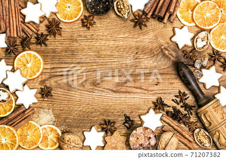 Christmas food background Cookies spices wooden table Christmas food background Cookies spices wooden table 71207382
