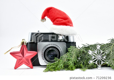 Old-fashioned Camera and  New Year. 71209236