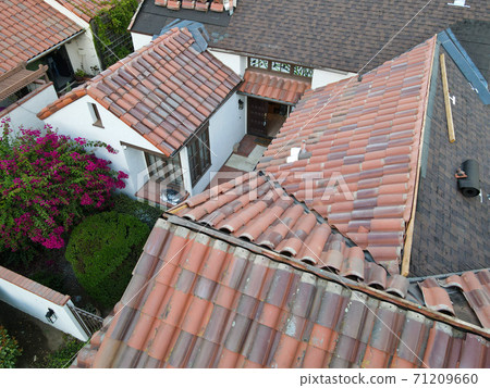 Aerial view over roof repair work Aerial view over roof repair work 71209660