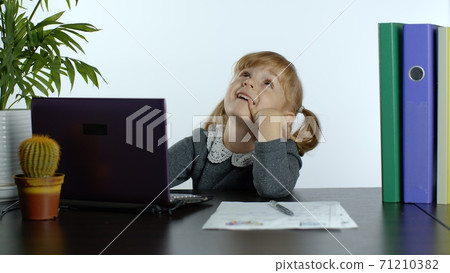 Back to school, online learning for kids, distance lesson, education at home. Child doing homework Back to school, online learning for kids, distance lesson, education at home. Child doing homework 71210382