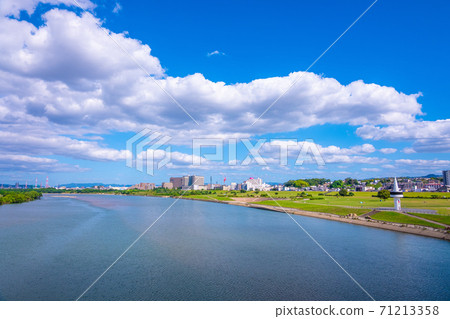 Cityscape of Hirakata City and Yodogawa Riverbed 71213358