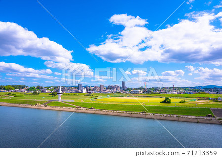 Cityscape of Hirakata City and Yodogawa Riverbed 71213359
