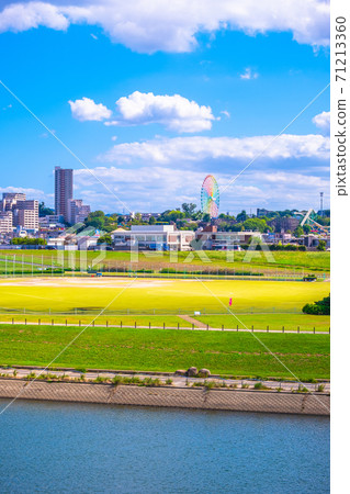 Cityscape of Hirakata City and Yodogawa Riverbed 71213360
