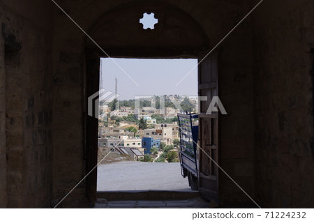 [Jordan] Irbid, outside cityscape seen from the door of the Ummukais Archaeological Museum 71224232