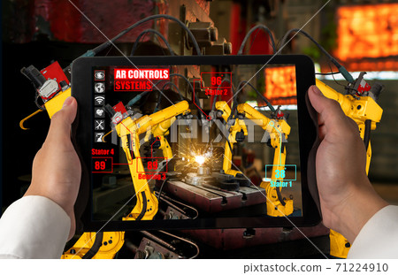 Engineer controls robotic arms by augmented reality industry technology Engineer controls robotic arms by augmented reality industry technology 71224910